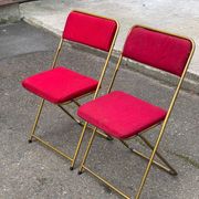 2 folding opera chairs Lafuma France 1970 in gold and burgundy.