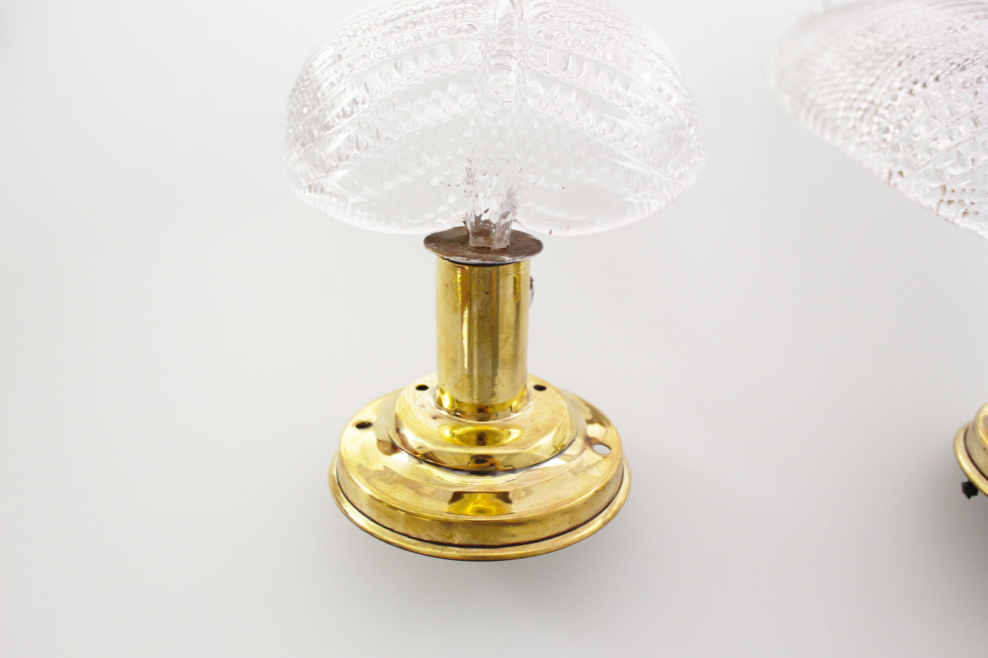Pair of brass and muranoglass shell sconces