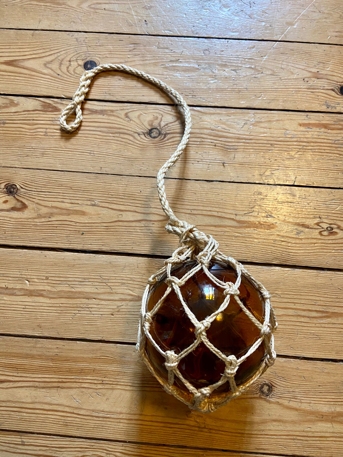 Marine float in glass and rope