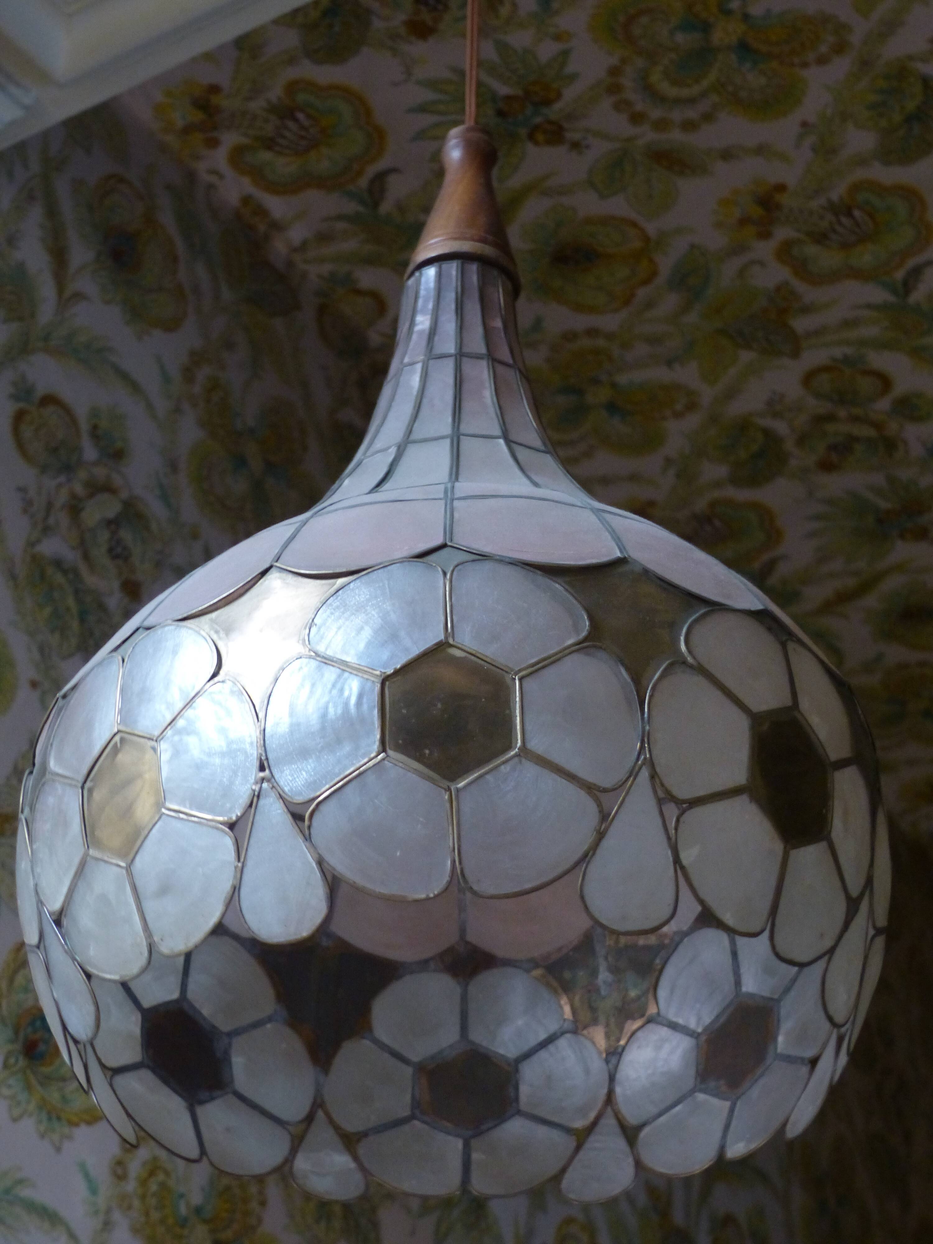 Colorful mother-of-pearl chandelier and brass