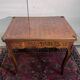 Game table in marquetry in the Louis XV style from the late 19th century.