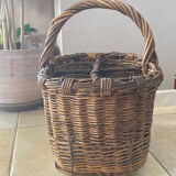 Wicker and hazel bottle basket from the early 20th century or possibly earlier.