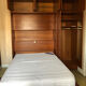 Murphy bed with built-in wardrobe and storage