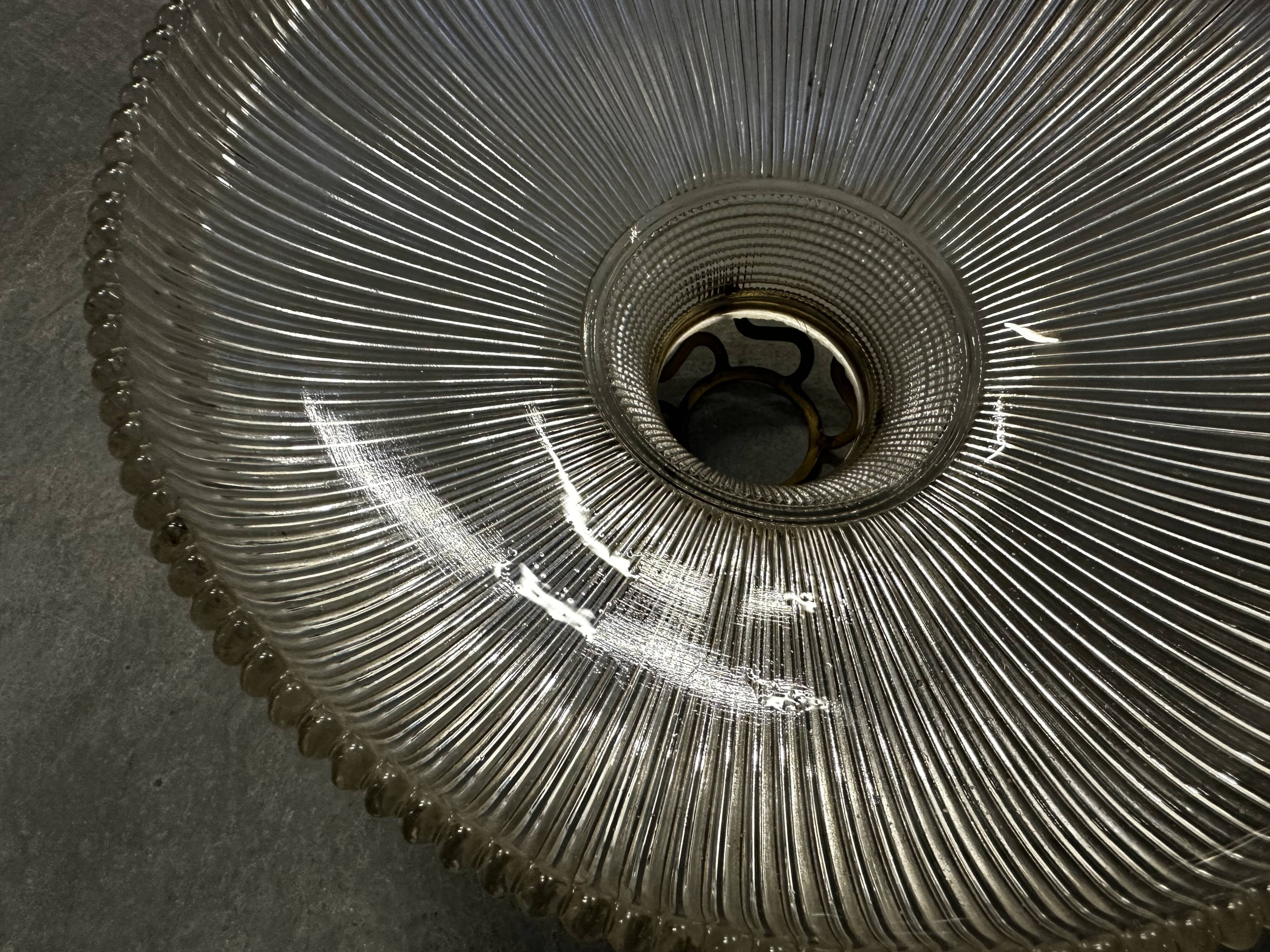 Suspension in holophane striated glass and brass support - art-deco period