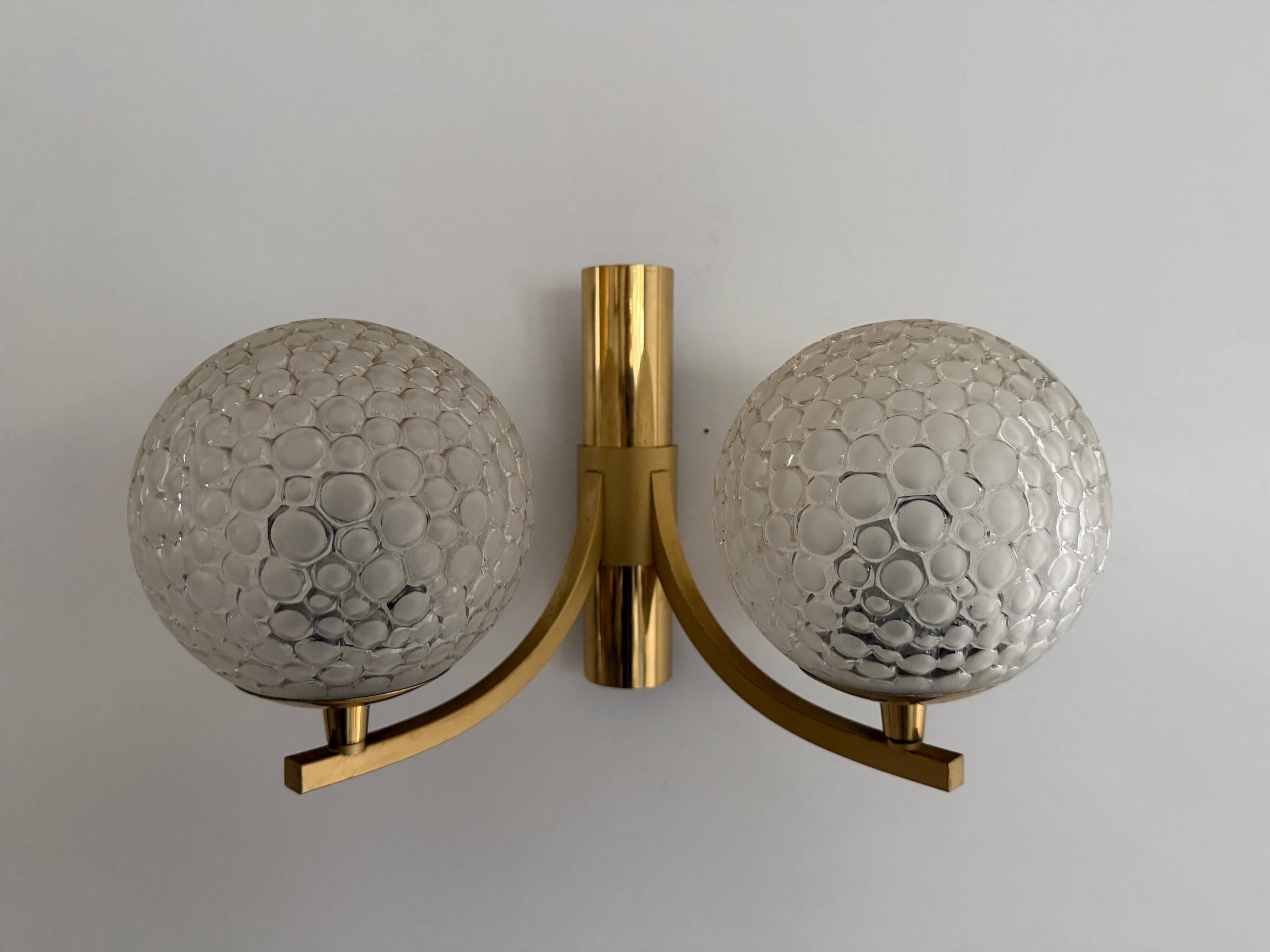 Simple two-armed wall light in brass and glass by Ball and Ball, Kaiser, 1960s, Germany.