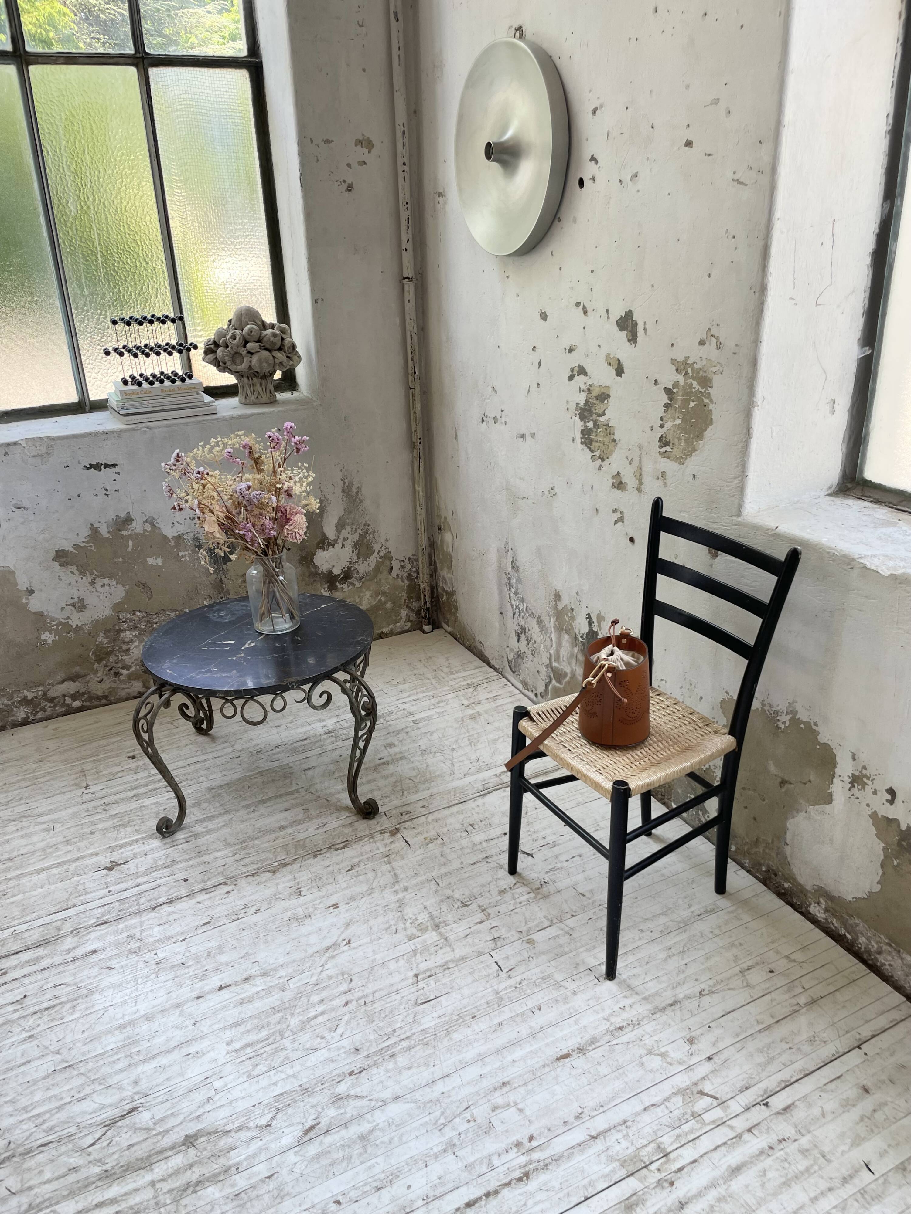 René Drouet coffee table in metal and black marble.