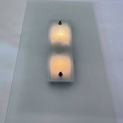 Paire de lampes murales ou plafonniers design des années 1970.