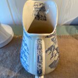 Old Longchamp iron earth pitcher