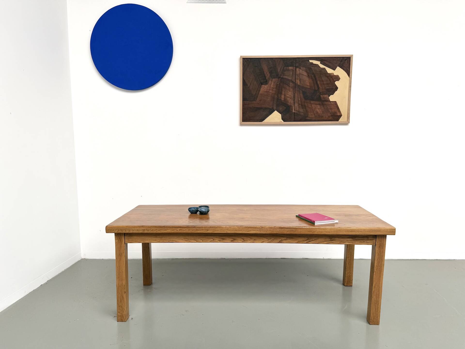 Solid oak farmhouse table, square legs.