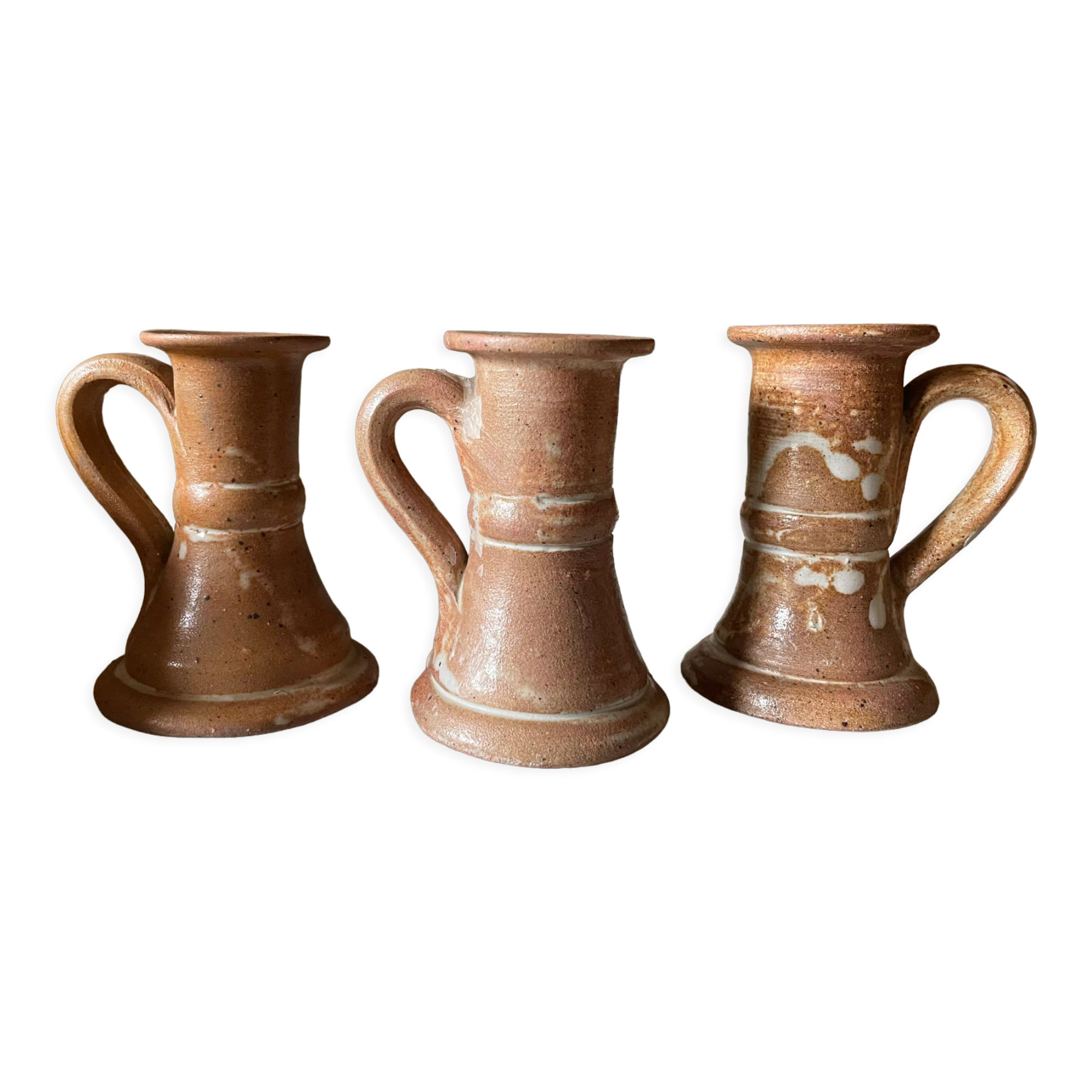 Trio of stoneware candle holders