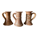 Trio of stoneware candle holders