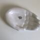 Empty white enamelled ceramic pocket in the shape of a large hand, 1990