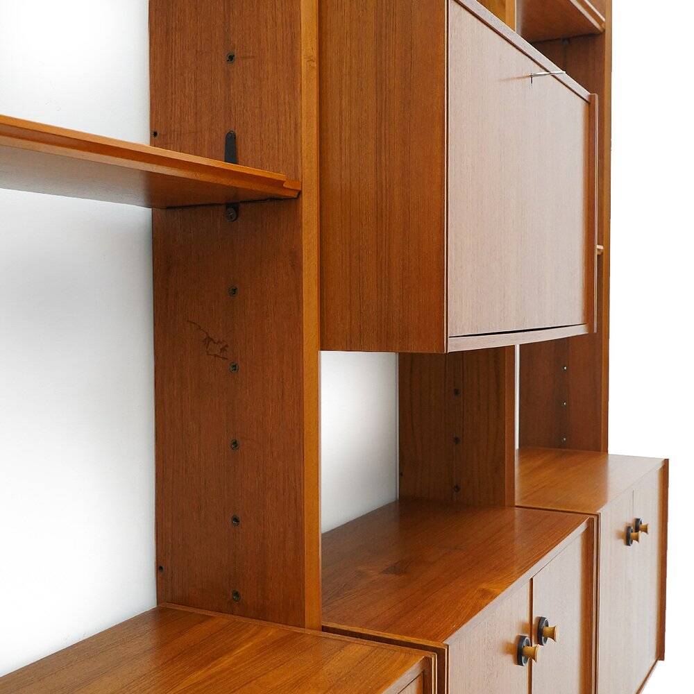Library with wooden uprights by A.V. Contemporary Furnishings, 1960s.