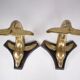 Solid brass dolphin console feet.