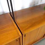 Modulair Omnia wandsysteem, Hilker, teak en zwart staal met legplanken