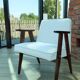 Scandinavian boucle armchair in snow white with dark walnut wood colour, designed by Chierowski, model 366.