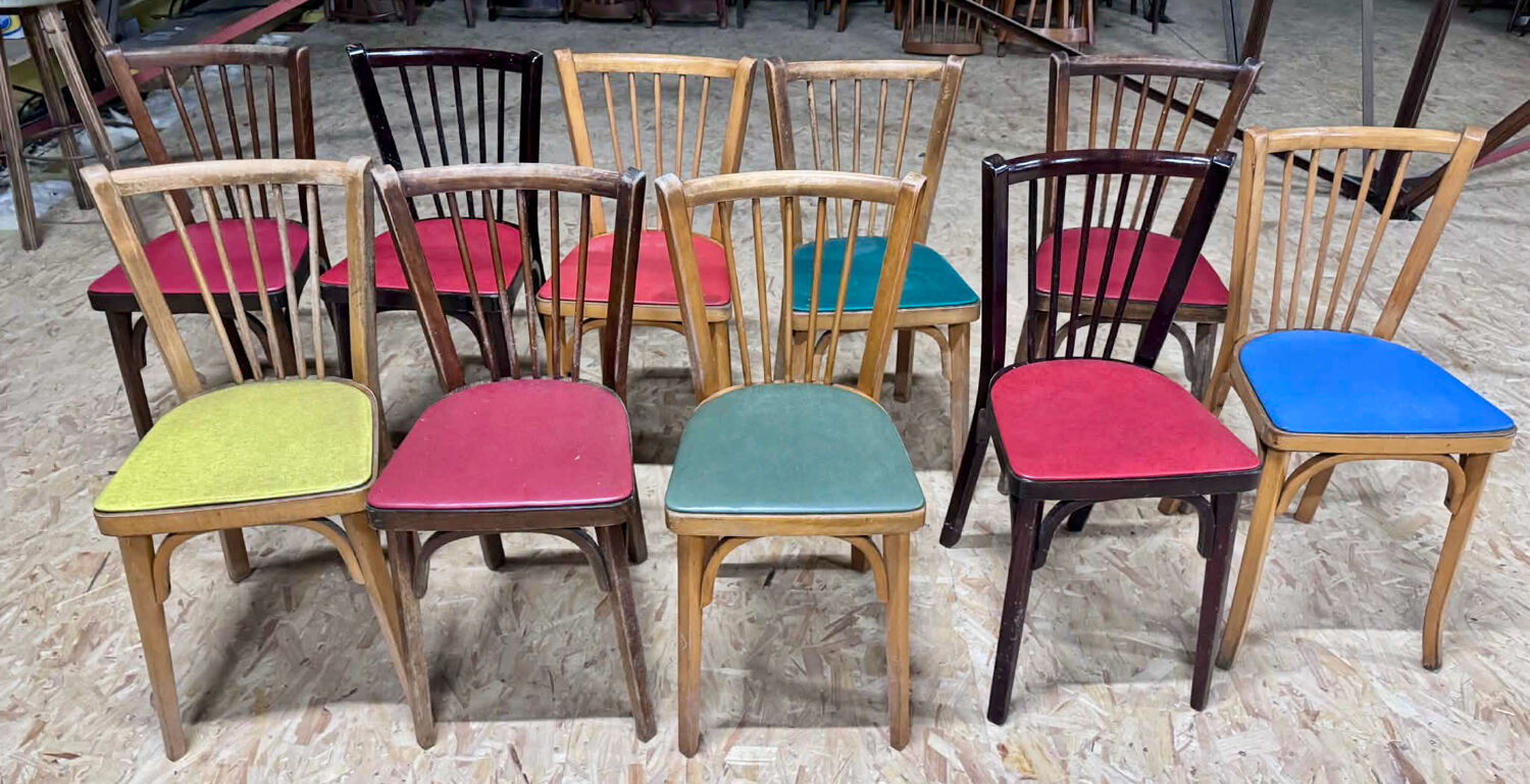 Set of 10 Baumann bistro chairs with curved wood and Skaï seat.