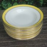 Lot de treize assiettes creuses en porcelaine ancienne signées " Biarritz"