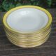 Set of thirteen old porcelain soup plates signed "Biarritz"