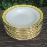 Set of thirteen old porcelain soup plates signed "Biarritz"