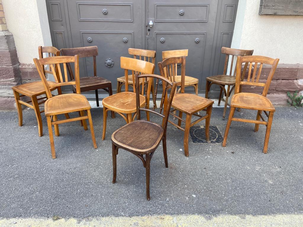 Set of 10 mismatched curved wood bistro chairs from the 1950s-60s