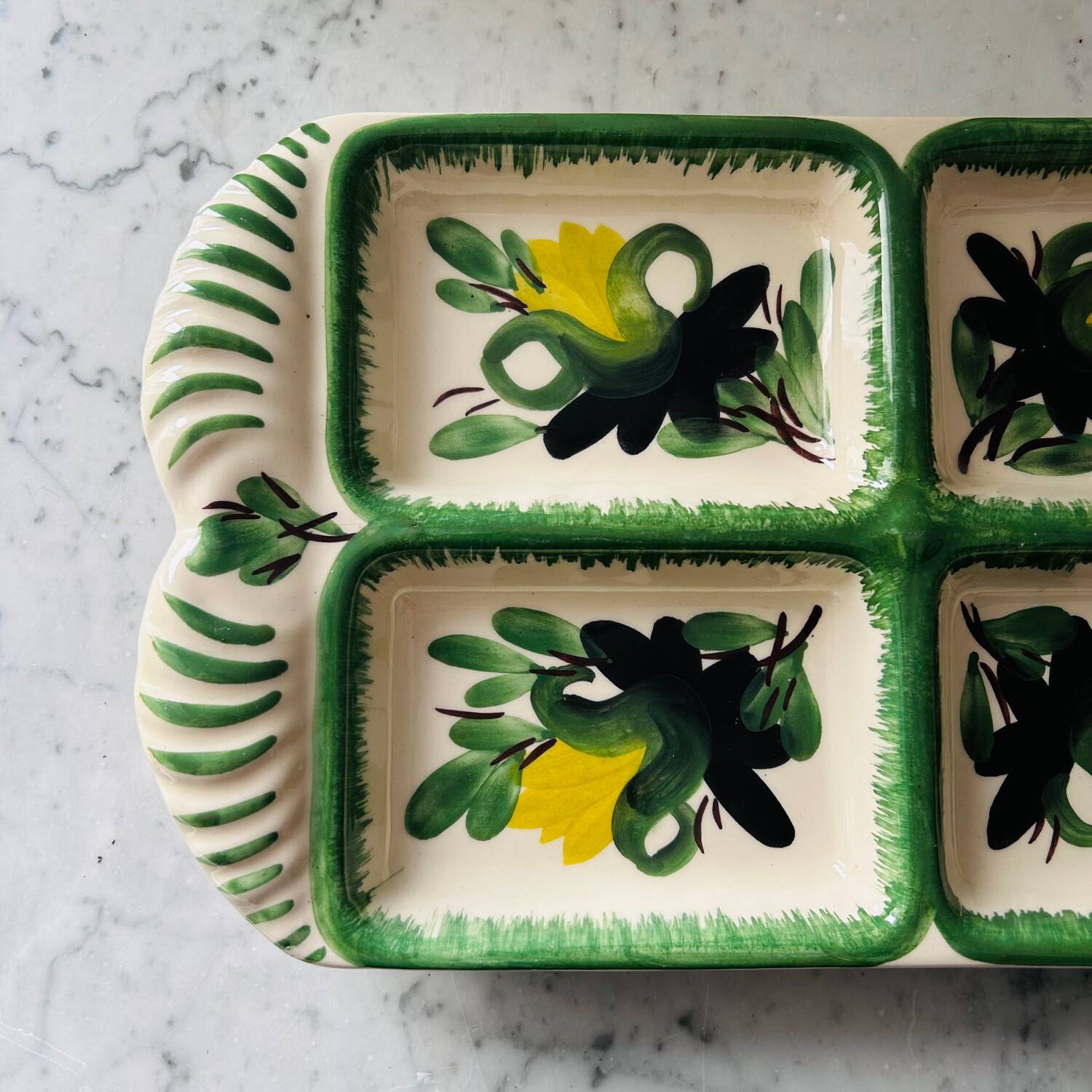 Serving dish with floral decoration signed