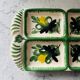 Serving dish with floral decoration signed