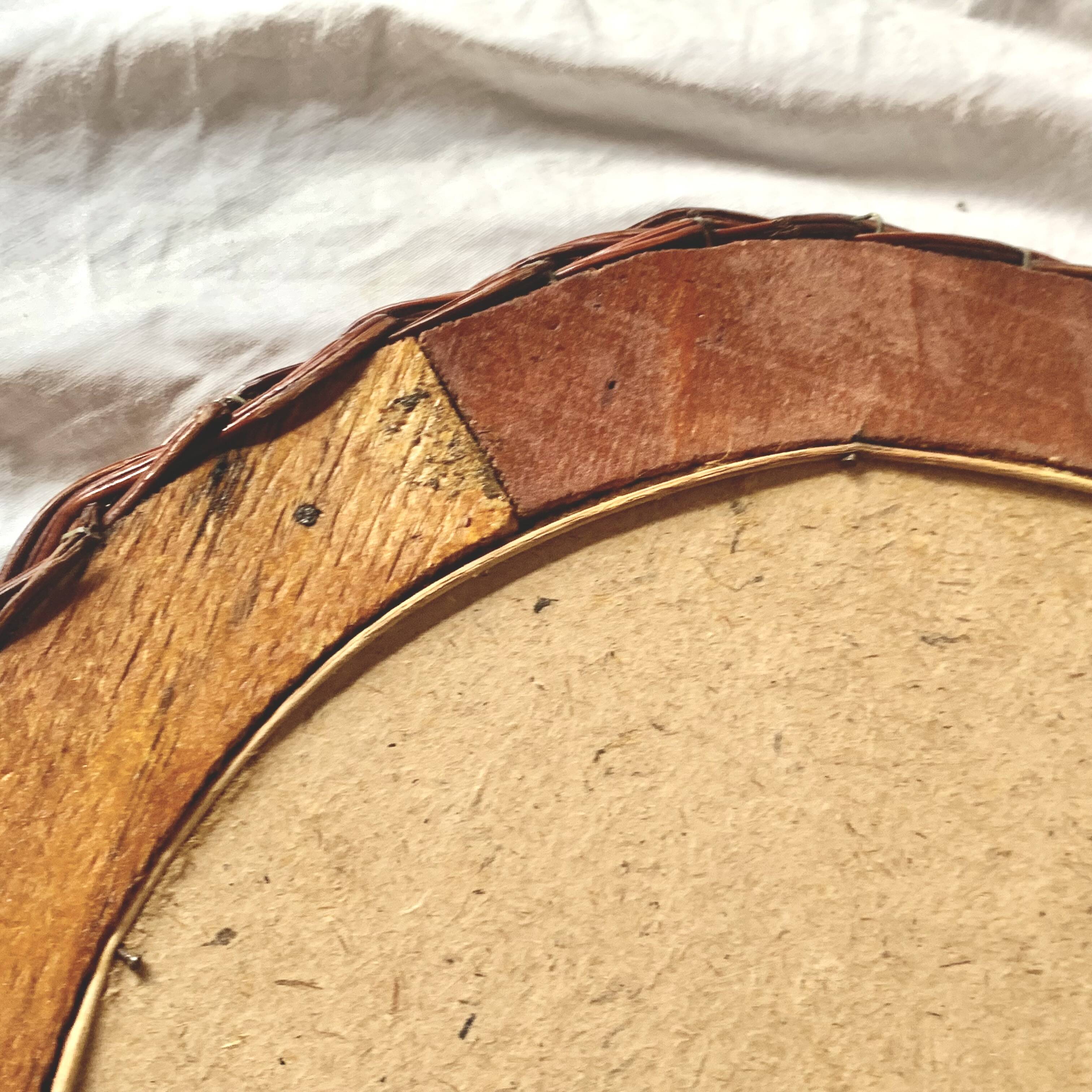 Vintage round woven rattan wall mirror