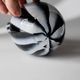 Vintage Murano glass vase from the 1980s, black and white swirl pattern, thick Italian art glass.