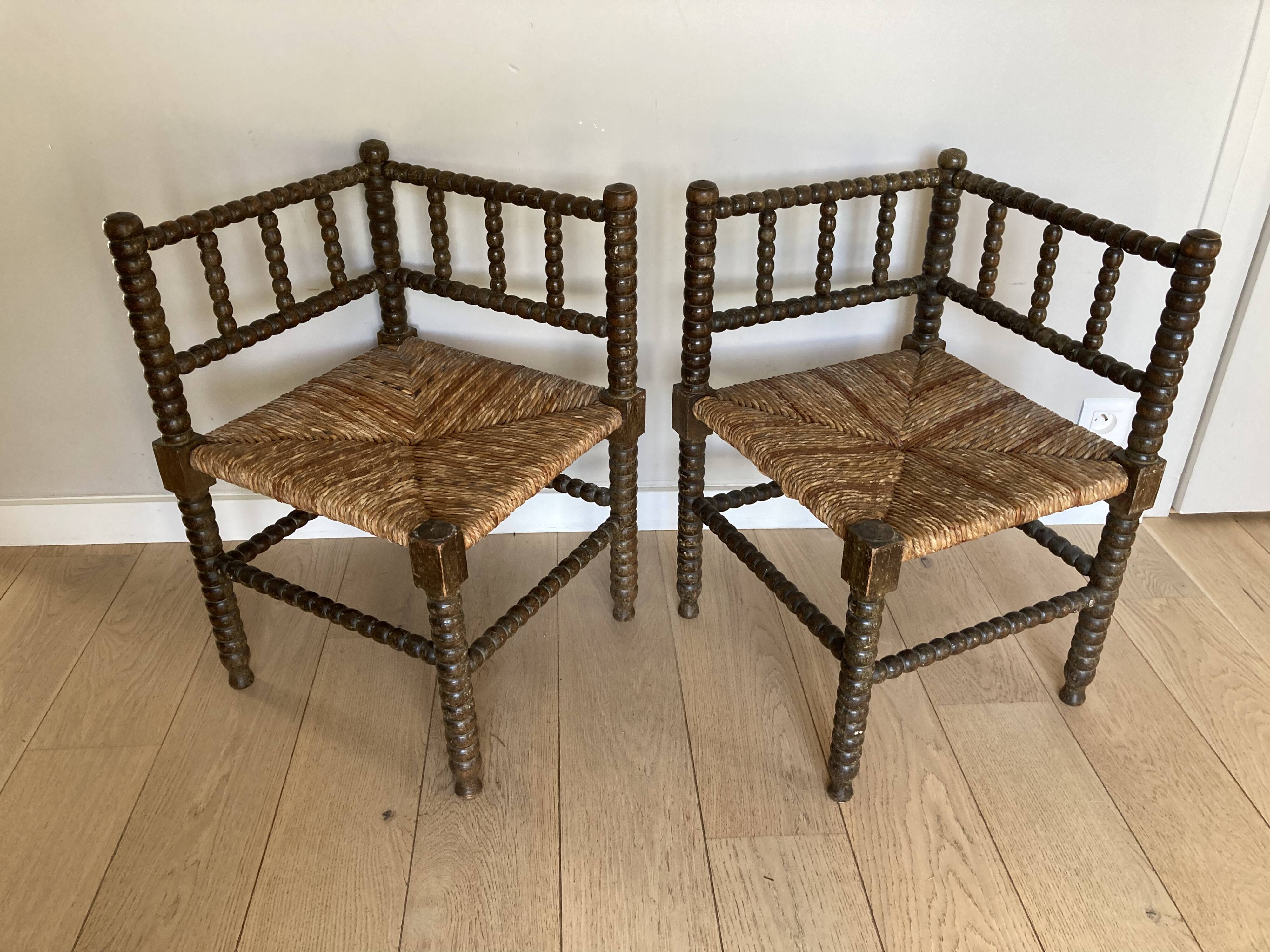 Turned wood corner armchairs