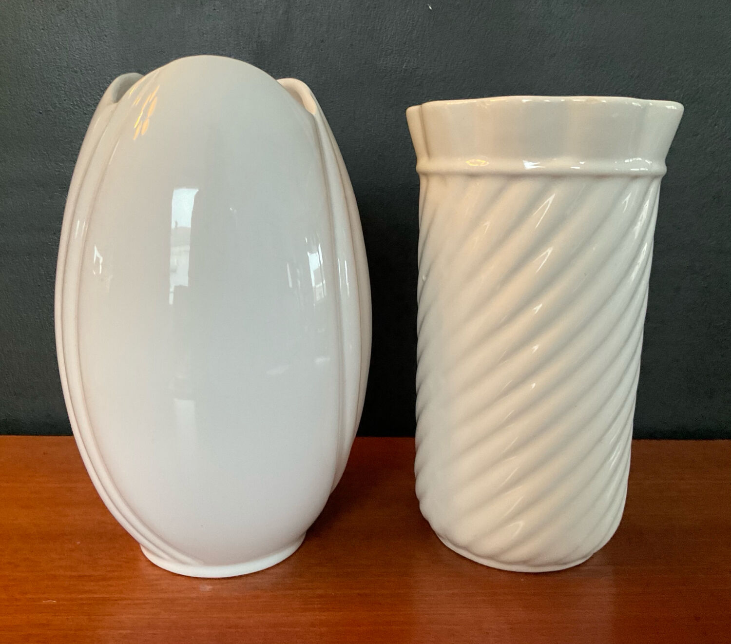 A pair of vintage ceramic vases from the 1970s.