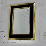 Jean-Claude Mahey mirror. Black lacquered wood and gold metal. 1970