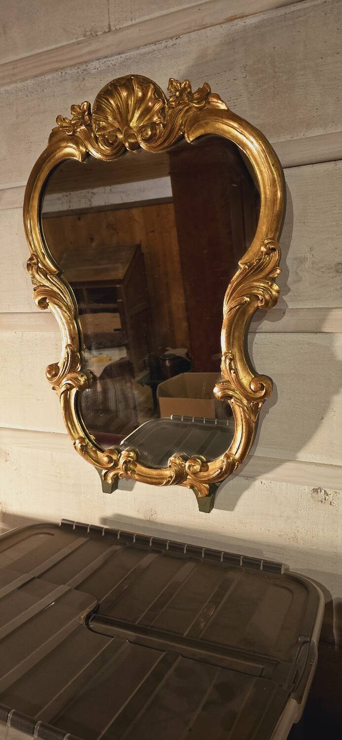 Golden wood mirror.