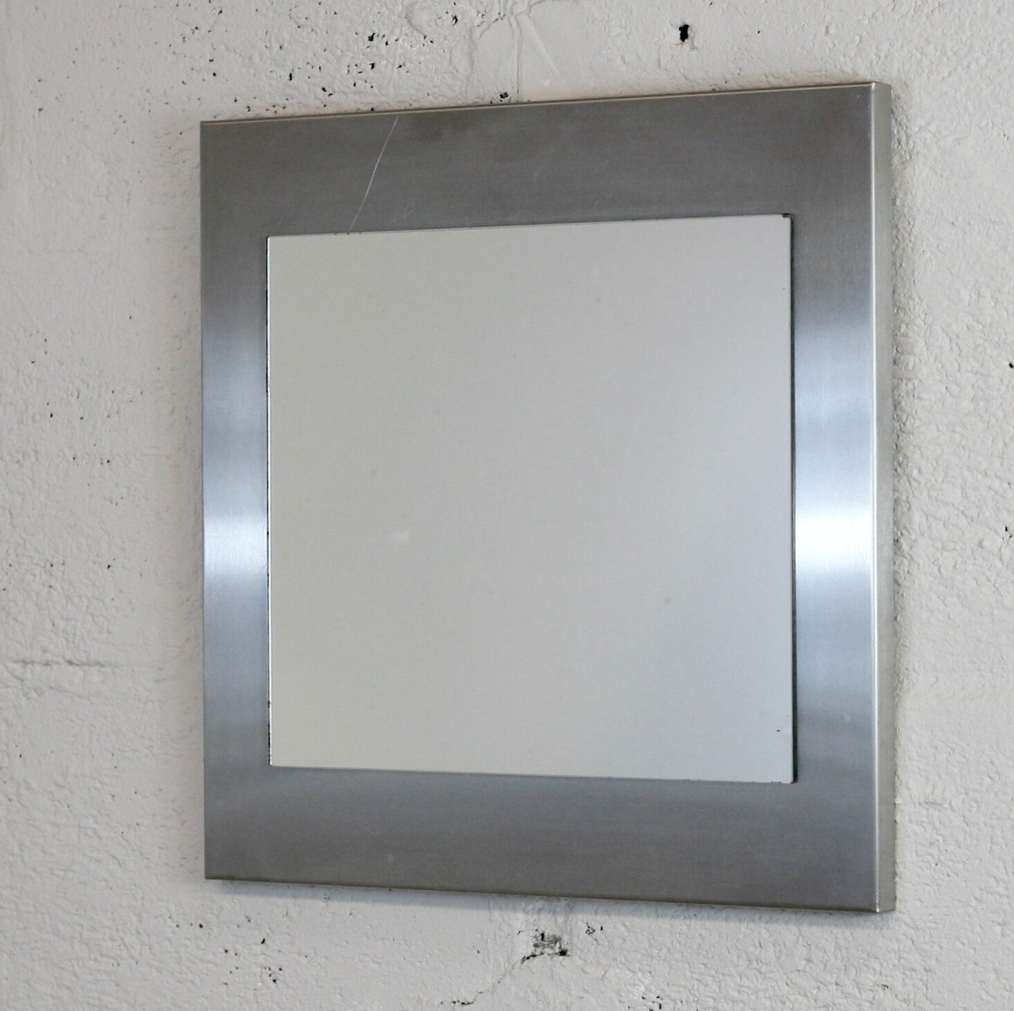 Mirror "space age". Stainless steel. France, circa 1970