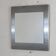 Miroir "space age". Acier inoxydable. France, circa 1970