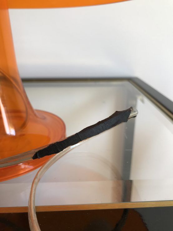 Orange nessino pose lamp for artemide by giancarlo mattioli