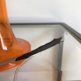 Orange nessino pose lamp for artemide by giancarlo mattioli
