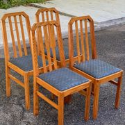 4 solid wood and blue fabric dining chairs with bars