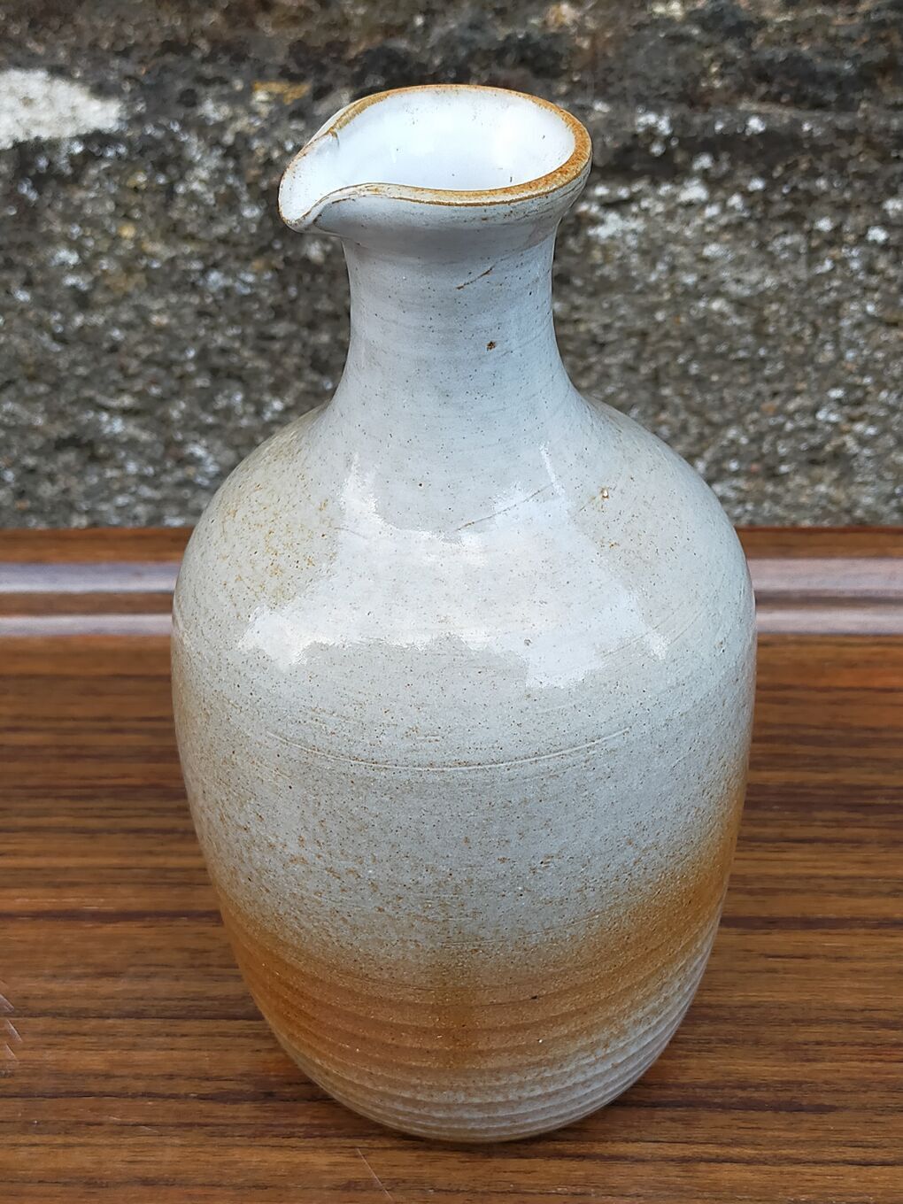 Light stoneware potter's bottle with vintage spout