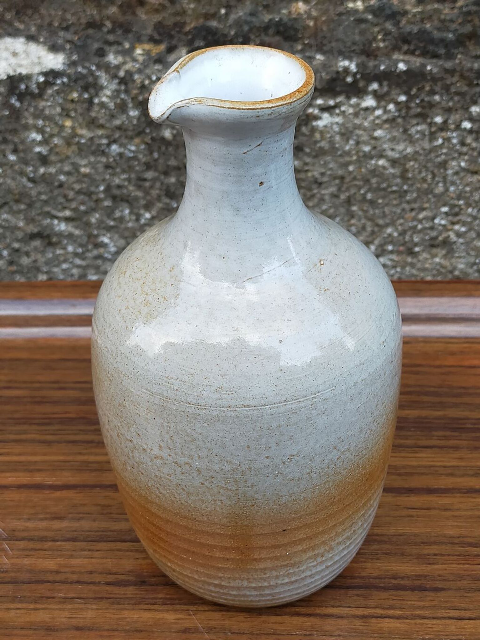 Light stoneware potter's bottle with vintage spout