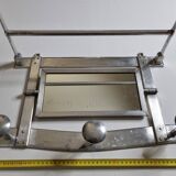 Metal wall coat rack, adjustable mirror, 3 coat hooks and a hat rack, 1950s