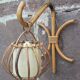 Pair of Louis Sognot rattan wall lights.