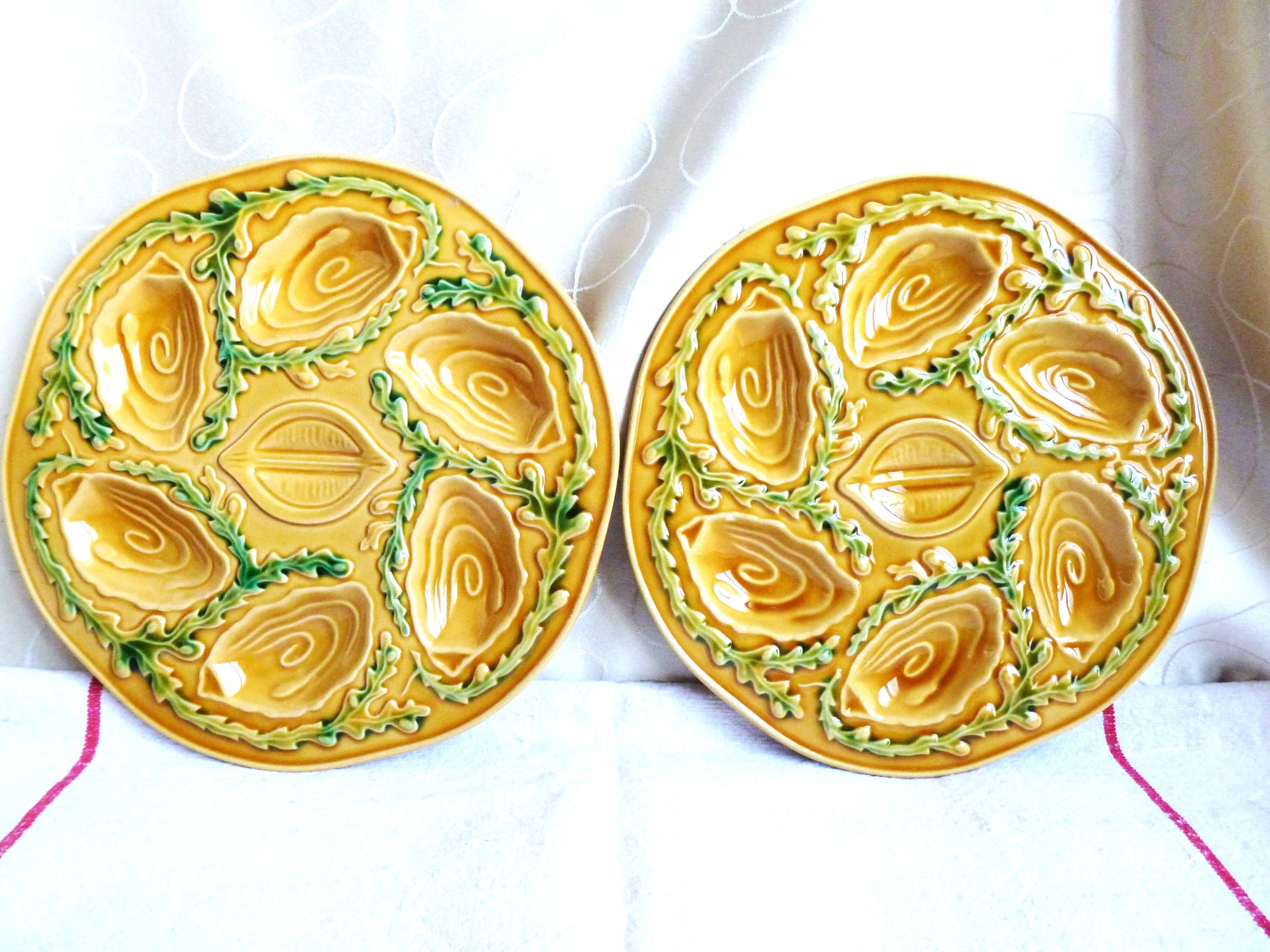 Oyster plates in slip, seafood plates, festive table.