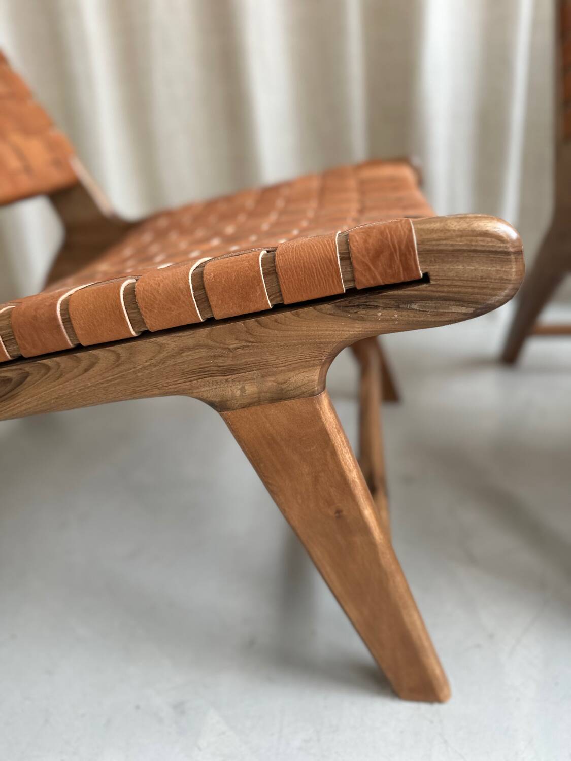 Pair of leather and walnut armchairs