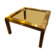 Gold square coffee table and smoked glass