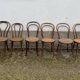 Set of 10 bentwood bistro chairs with cane seat.