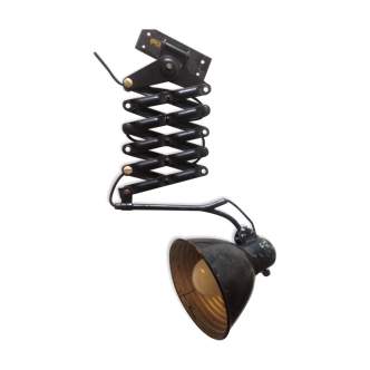 Accordion wall sconce