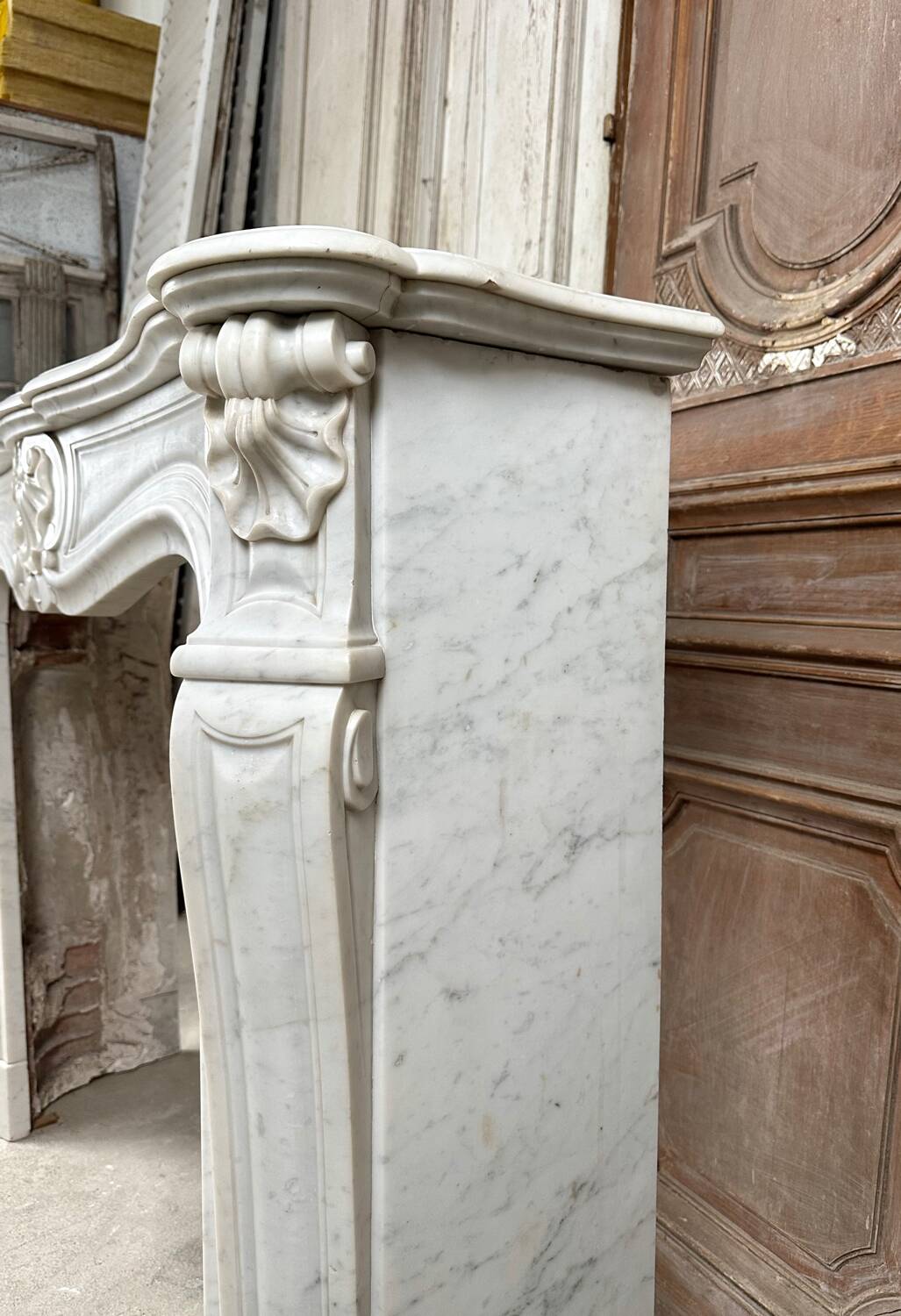 Louis XV style fireplace in white marble
