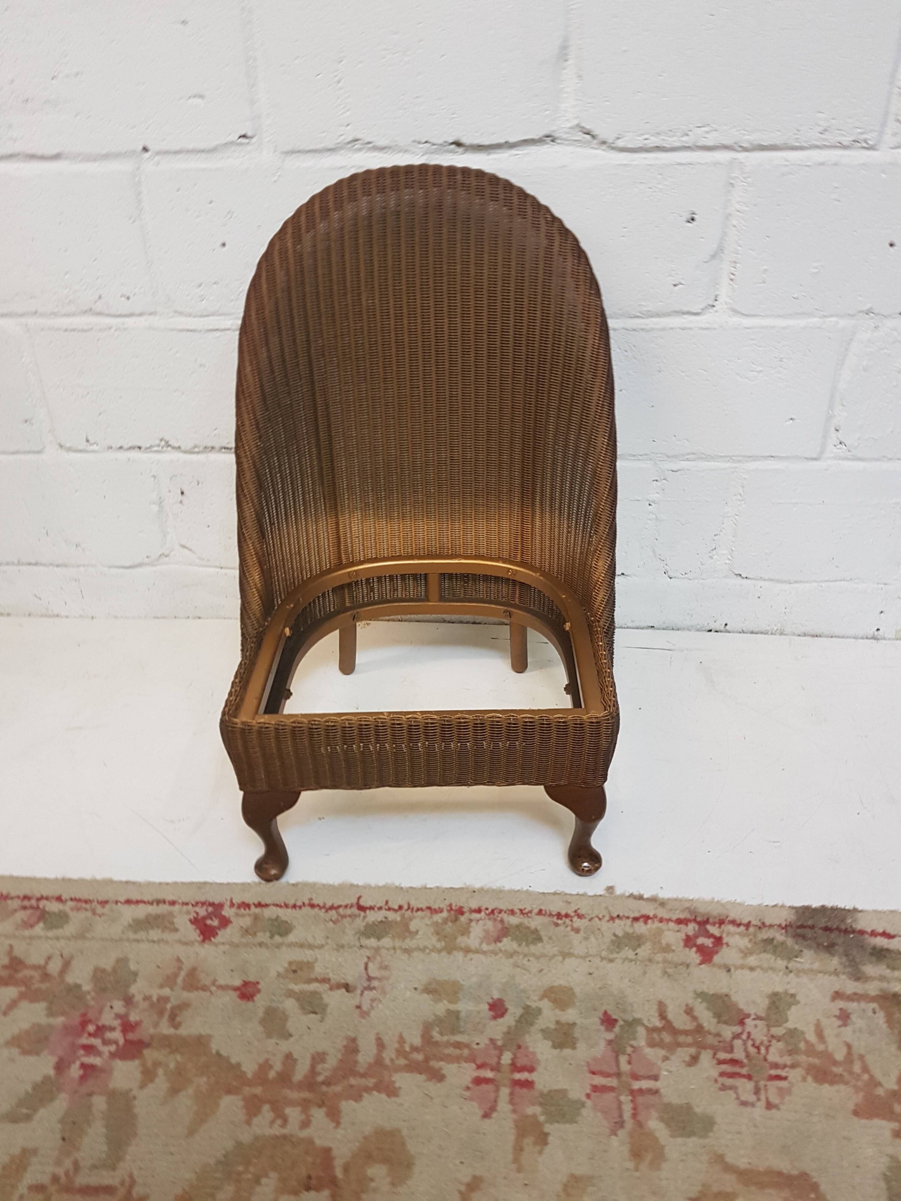 Lloyd loom armchair