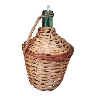 Small bottle style dame Jeanne and its wicker